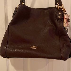 Practically new coach bag with cover